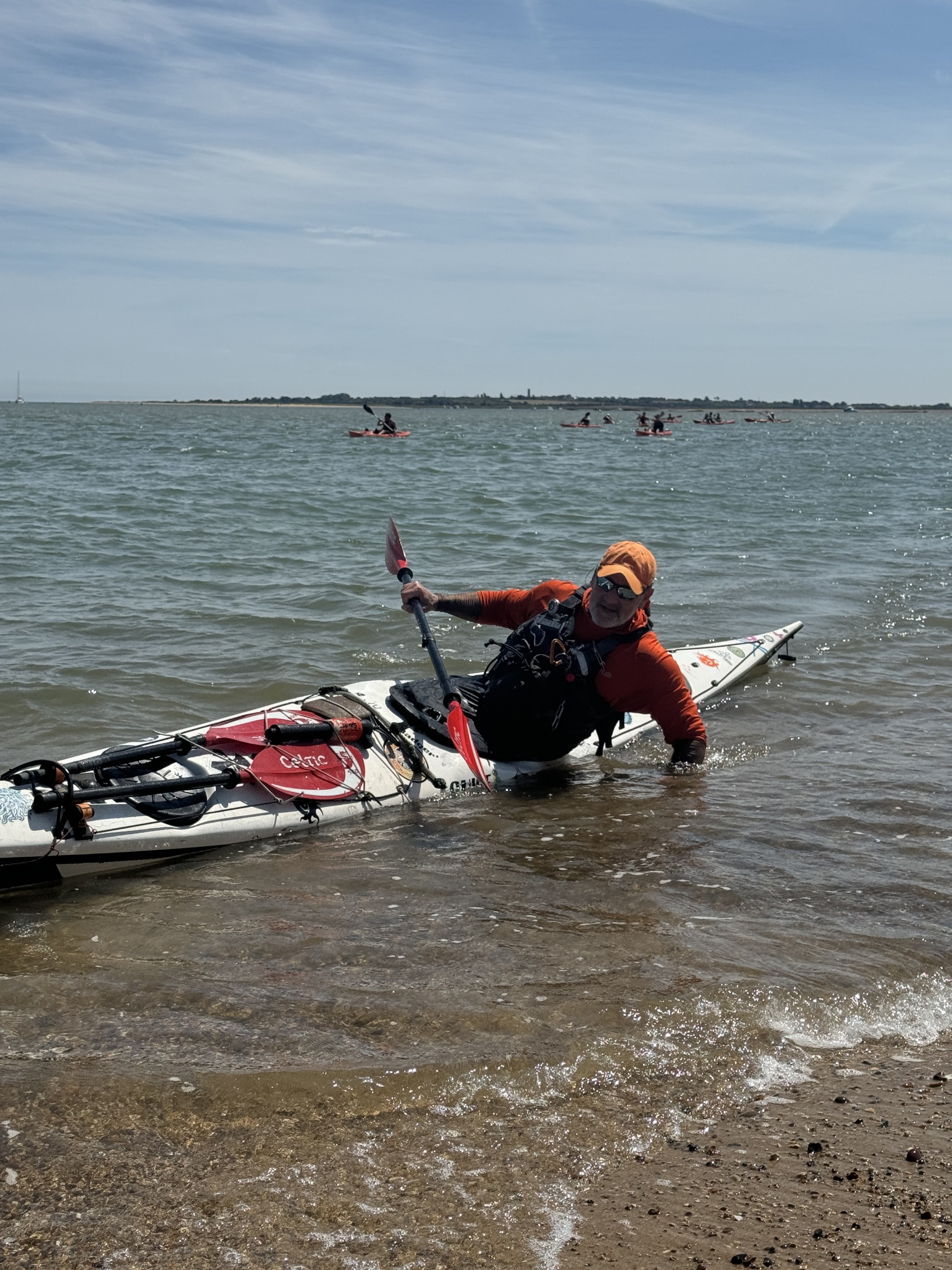 Sea kayaker on the Essex coast with NOMAD Sea Kayaking.